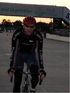 Under the finish banner, just slightly tired.